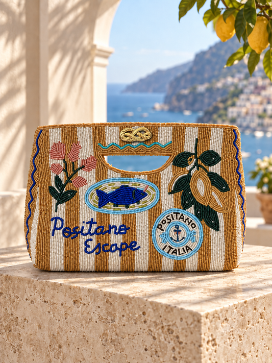 The Positano Escape Clutch - mustard and cream striped beaded clutch